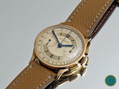 Pink gold Universale Geneve Chronograph retailed by LeCoultre 